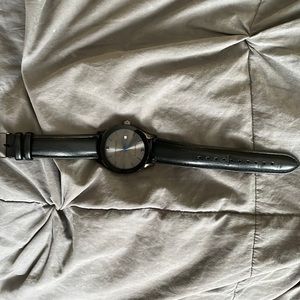 NWOT Geoffrey Beene Watch with leather band.